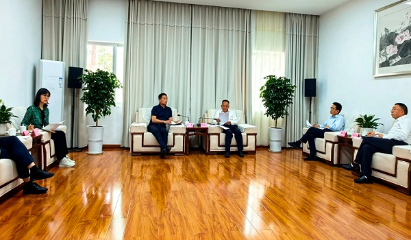 梁峰与广元市委常委、统战部部长、市总